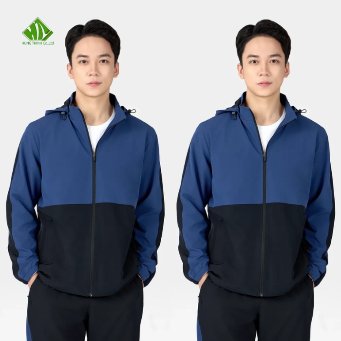 Ao gio dong phuc mau xanh than phoi den