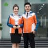 Ao khoac dong phuc mau cam phoi trang va xanh bich